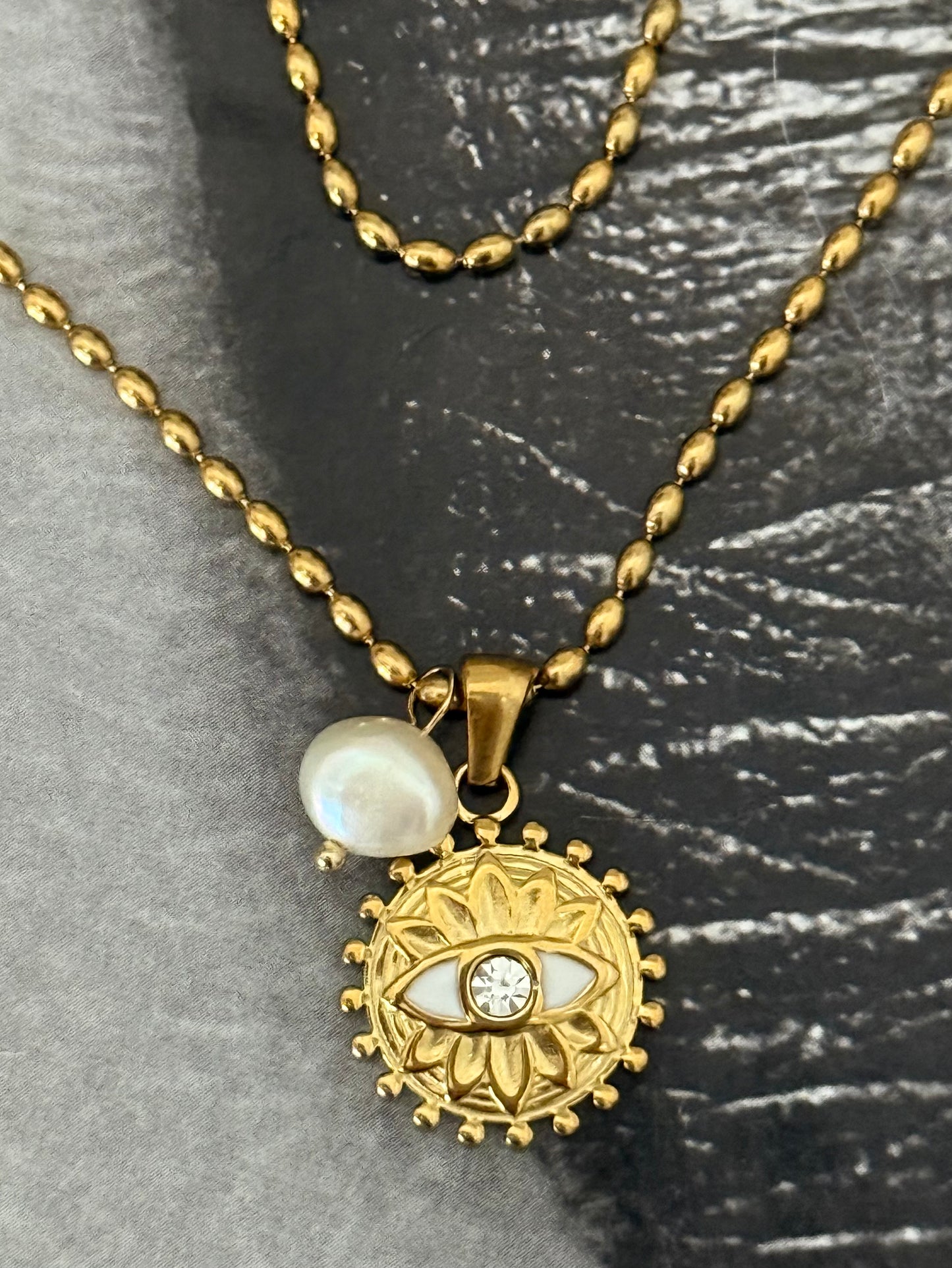 MYSTIQUE PEARL EYE NECKLACE