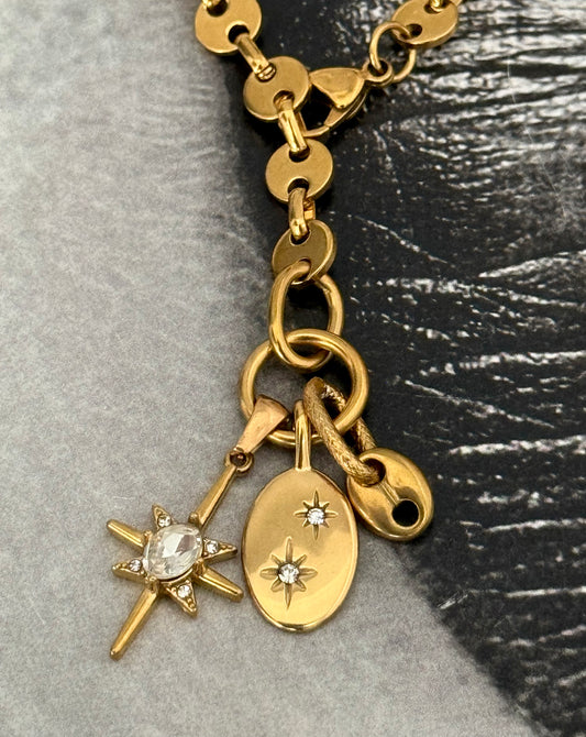 GOLDEN TIE CHARMS NECKLACE