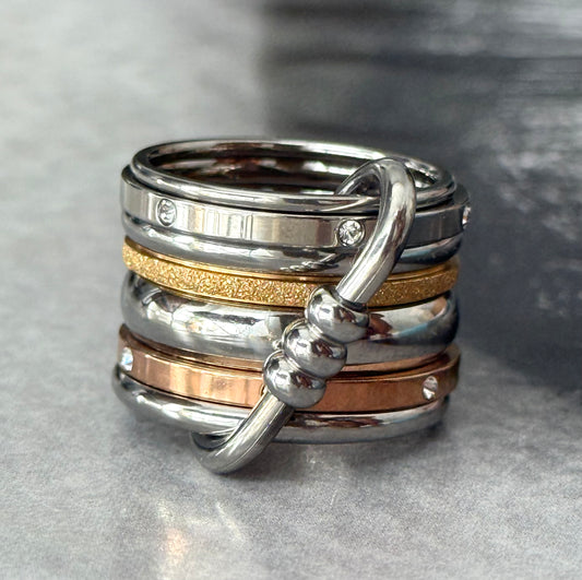 SEVEN BONDS RING (SIZE 7)