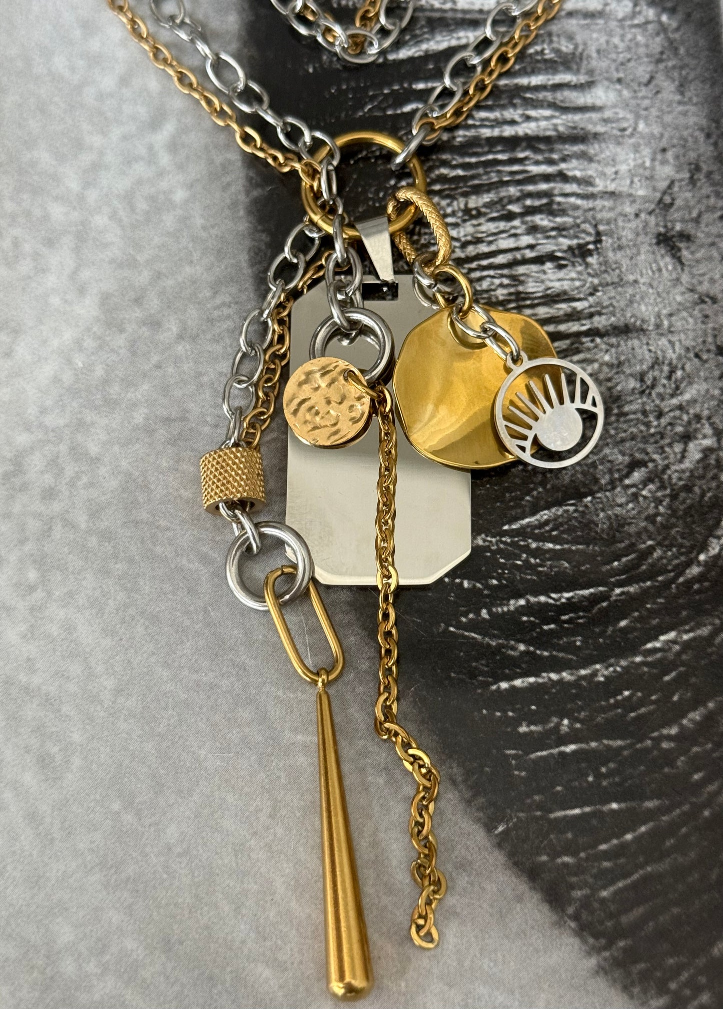 CHARM CASCADE NECKLACE