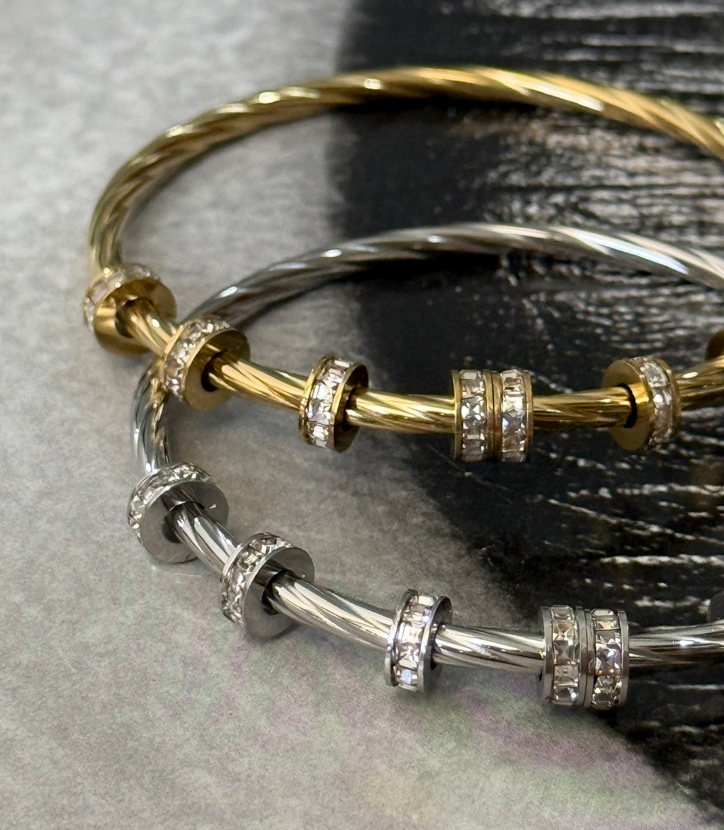 TWISTED GLOW BANGLE